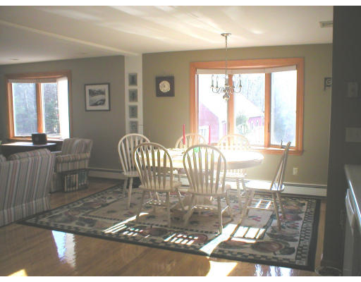 1037 Liberty Square Road Boxborough, MA 01719 - Photo 9 of 18 a view of a dining room with furniture