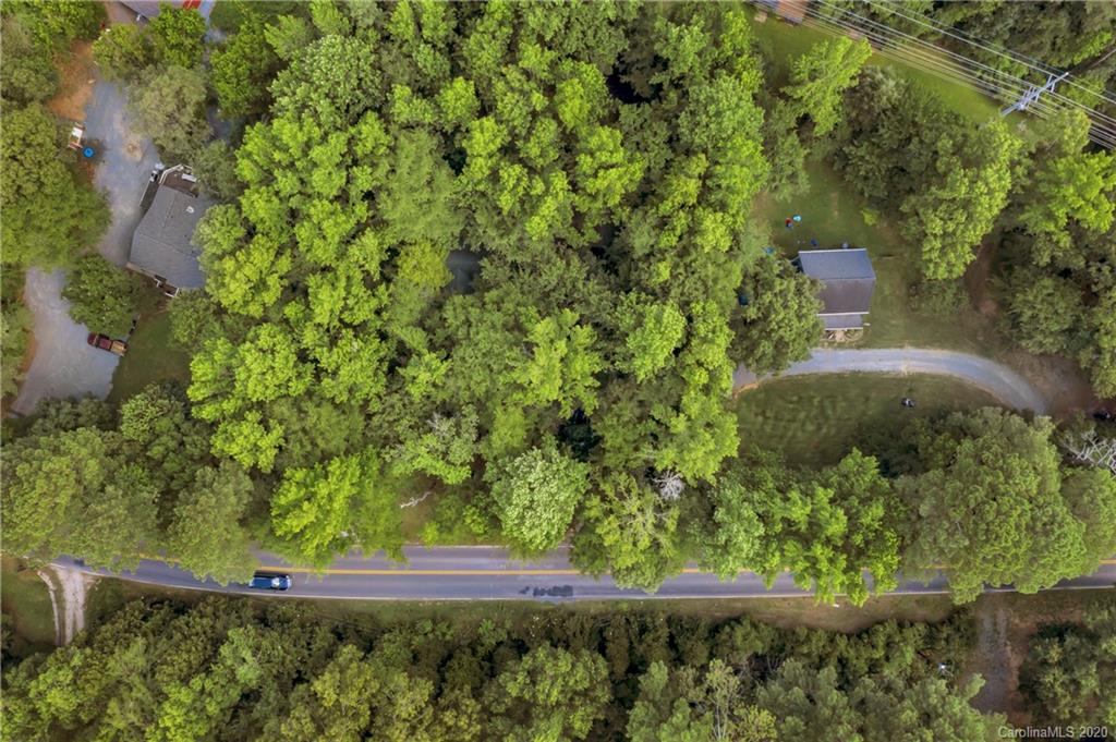 7109 New Town Road Waxhaw, NC 28173 - Photo 26 of 31 a view of a yard with large trees