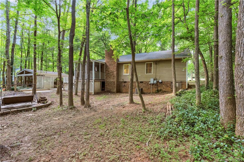 7109 New Town Road Waxhaw, NC 28173 - Photo 31 of 31 a house view with a backyard space