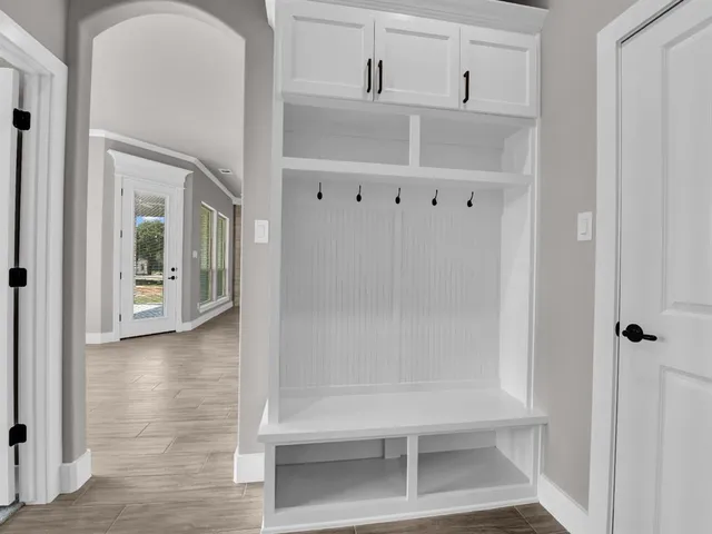 a view of a hallway with closet