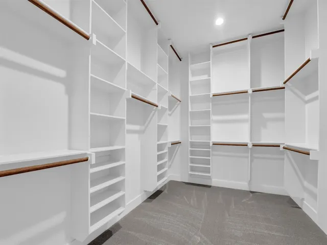 a view of an empty walk in closet