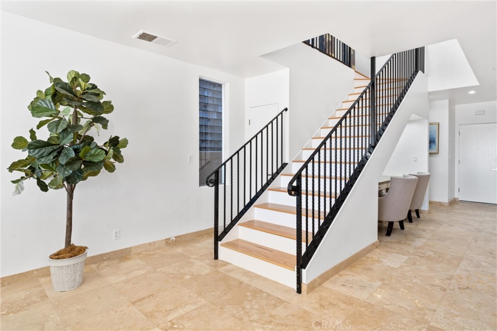 2804 West Oceanfront Newport Beach, CA 92663 - Photo 14 of 41 a view of entryway with a potted plant