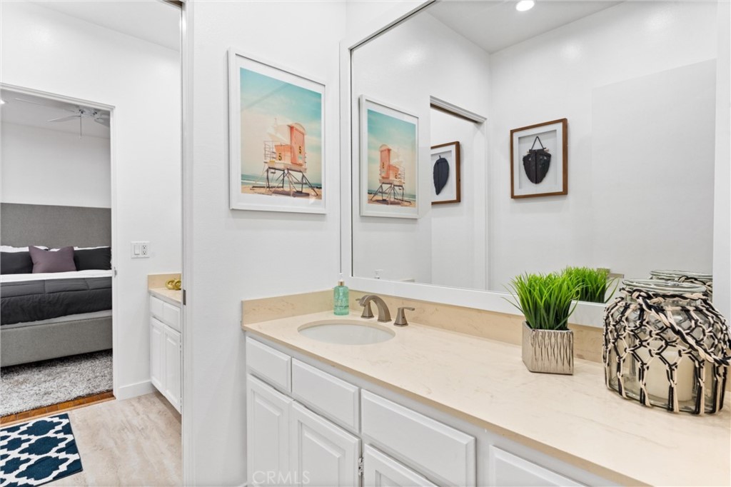 2804 West Oceanfront Newport Beach, CA 92663 - Photo 20 of 41 a bathroom with a sink and a mirror