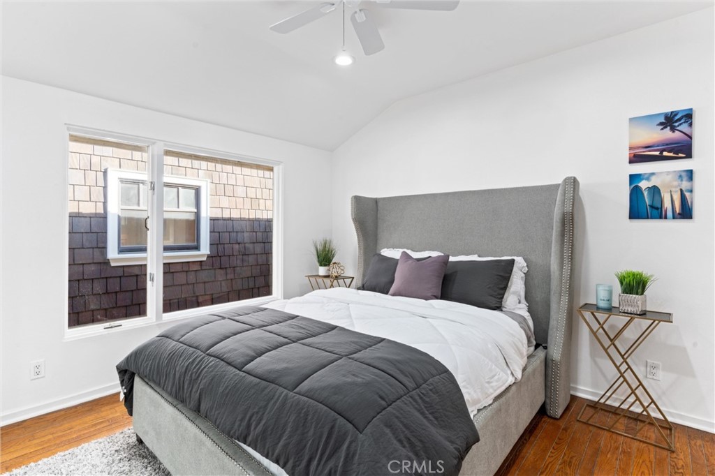 2804 West Oceanfront Newport Beach, CA 92663 - Photo 21 of 41 a bedroom with a bed and window