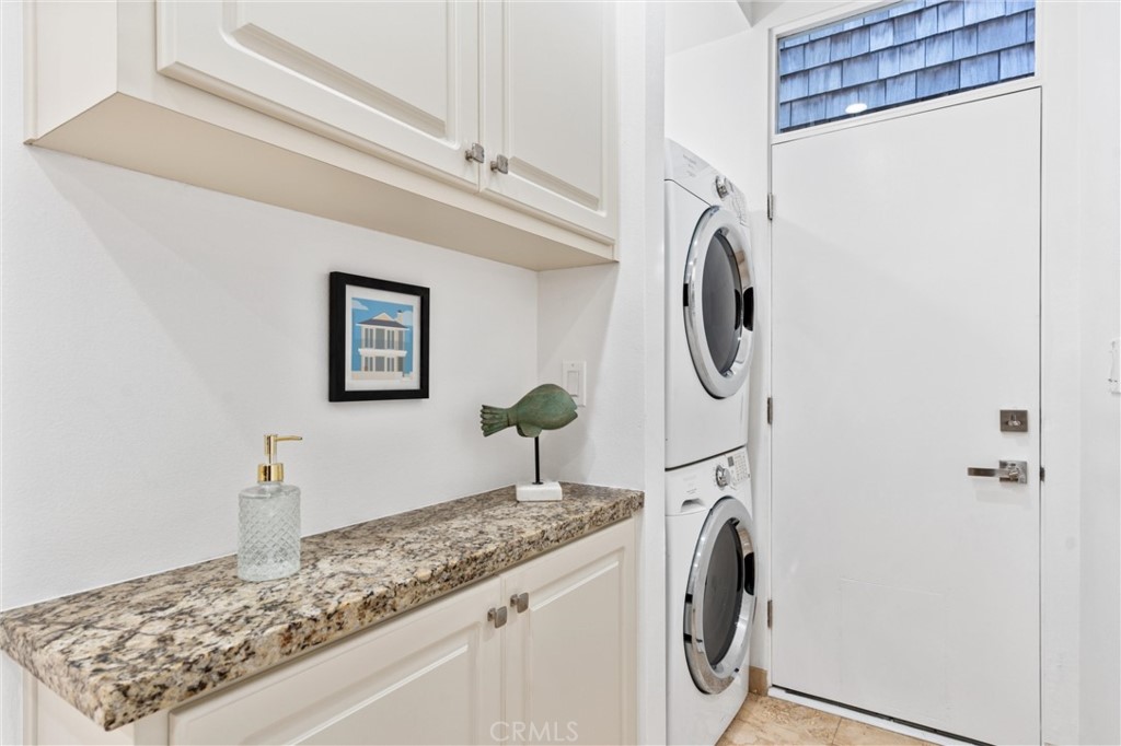 2804 West Oceanfront Newport Beach, CA 92663 - Photo 26 of 41 a utility room with dryer and washer