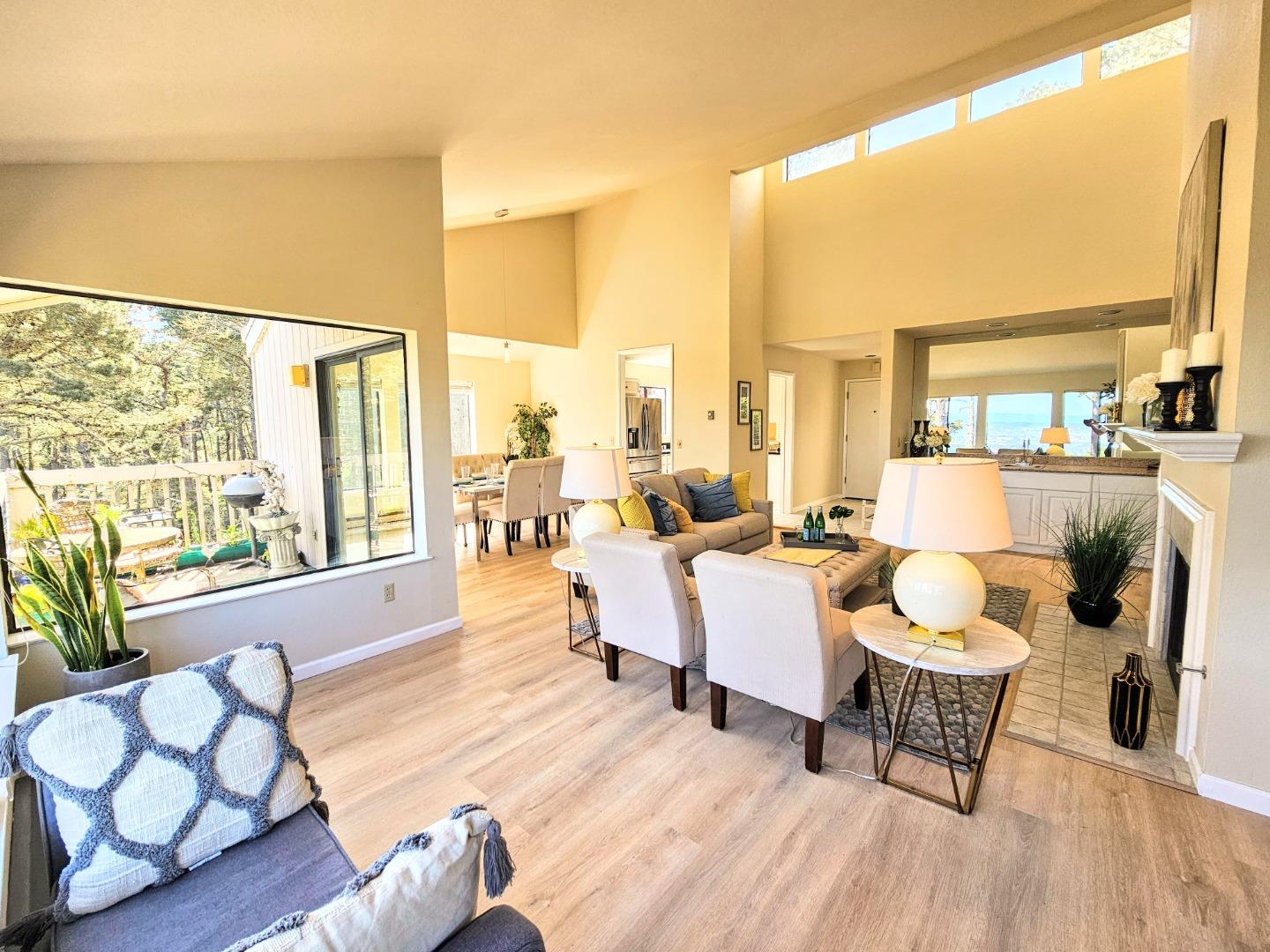 40 Shepherds Knoll Road, Unit 40 Monterey, CA 93940 - Photo 19 of 52 a living room with furniture and floor to ceiling windows