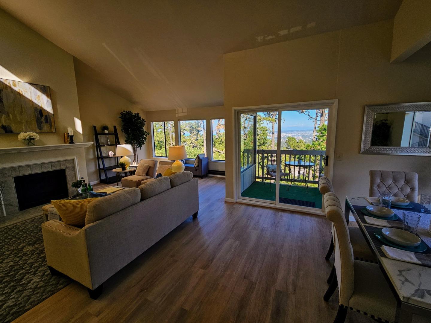 40 Shepherds Knoll Road, Unit 40 Monterey, CA 93940 - Photo 23 of 52 a living room with furniture a fireplace and a flat screen tv