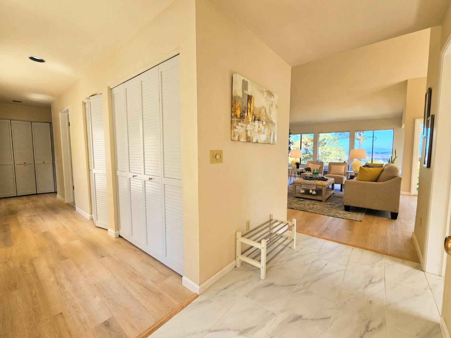 40 Shepherds Knoll Road, Unit 40 Monterey, CA 93940 - Photo 28 of 52 a view of a bedroom with furniture and a livingroom