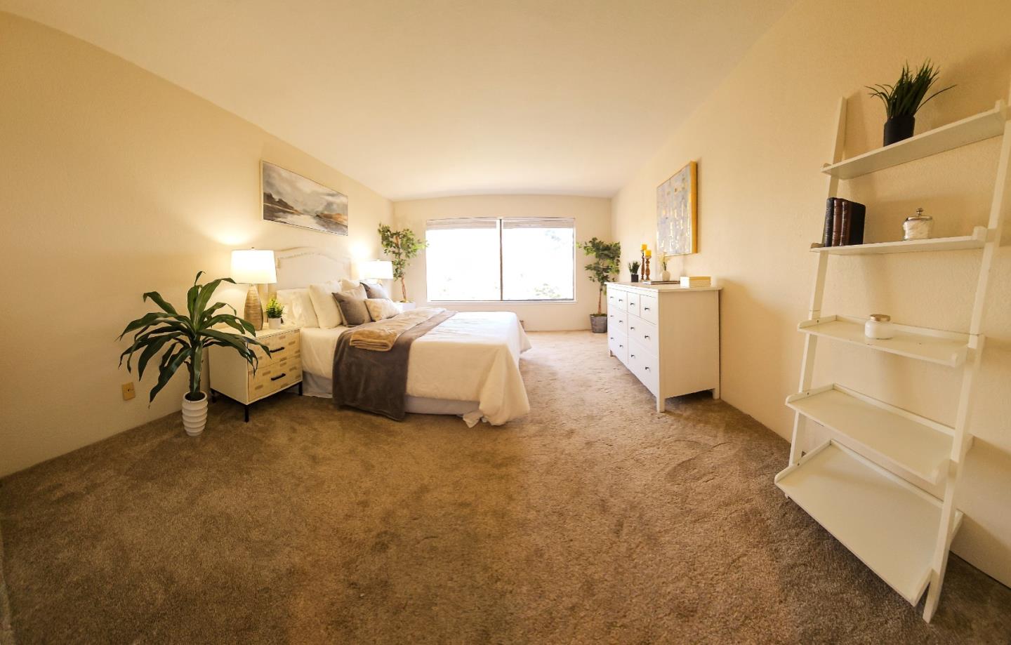 40 Shepherds Knoll Road, Unit 40 Monterey, CA 93940 - Photo 37 of 52 a bed room with furniture and a large window