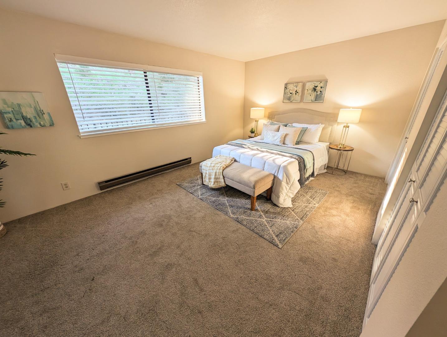 40 Shepherds Knoll Road, Unit 40 Monterey, CA 93940 - Photo 43 of 52 a bedroom with a bed and a window