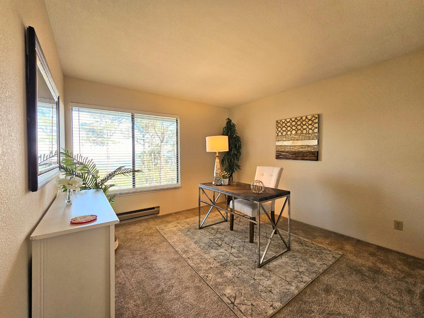 40 Shepherds Knoll Road, Unit 40 Monterey, CA 93940 - Photo 48 of 52 a living room with furniture and a large window
