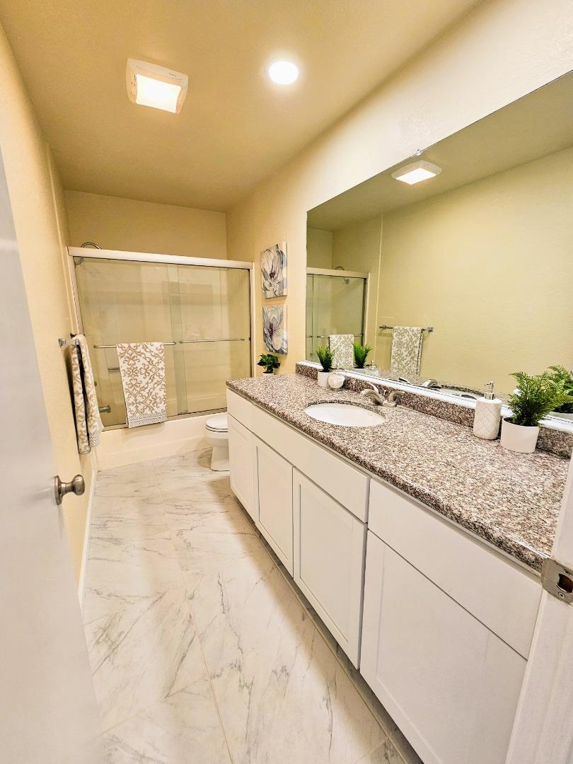 40 Shepherds Knoll Road, Unit 40 Monterey, CA 93940 - Photo 49 of 52 a spacious bathroom with a sink double vanity and a granite counter top