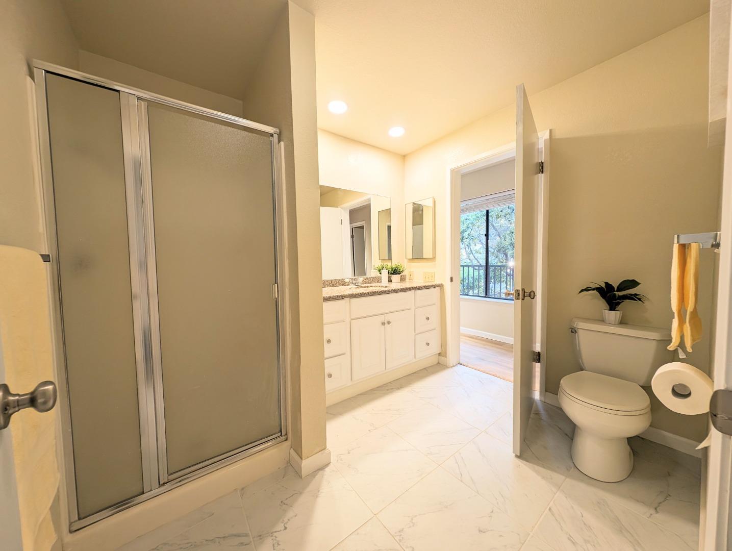 40 Shepherds Knoll Road, Unit 40 Monterey, CA 93940 - Photo 50 of 52 a bathroom with a granite countertop sink toilet and shower