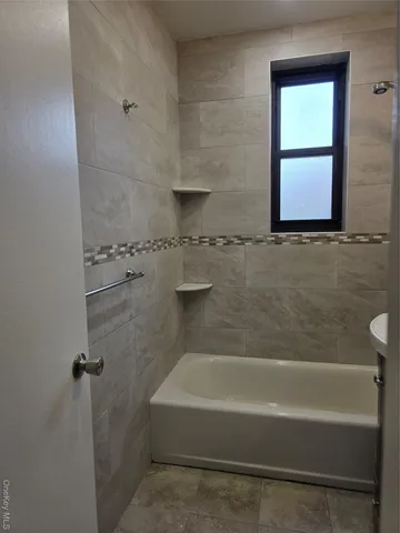 a bathroom with a bathtub