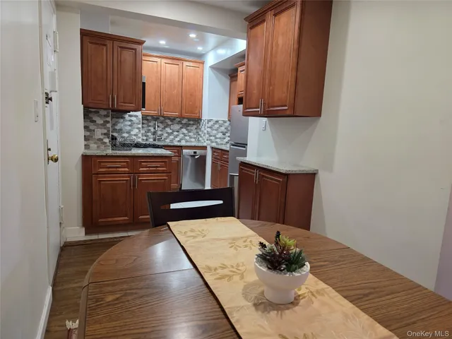 a kitchen with sink and cabinets