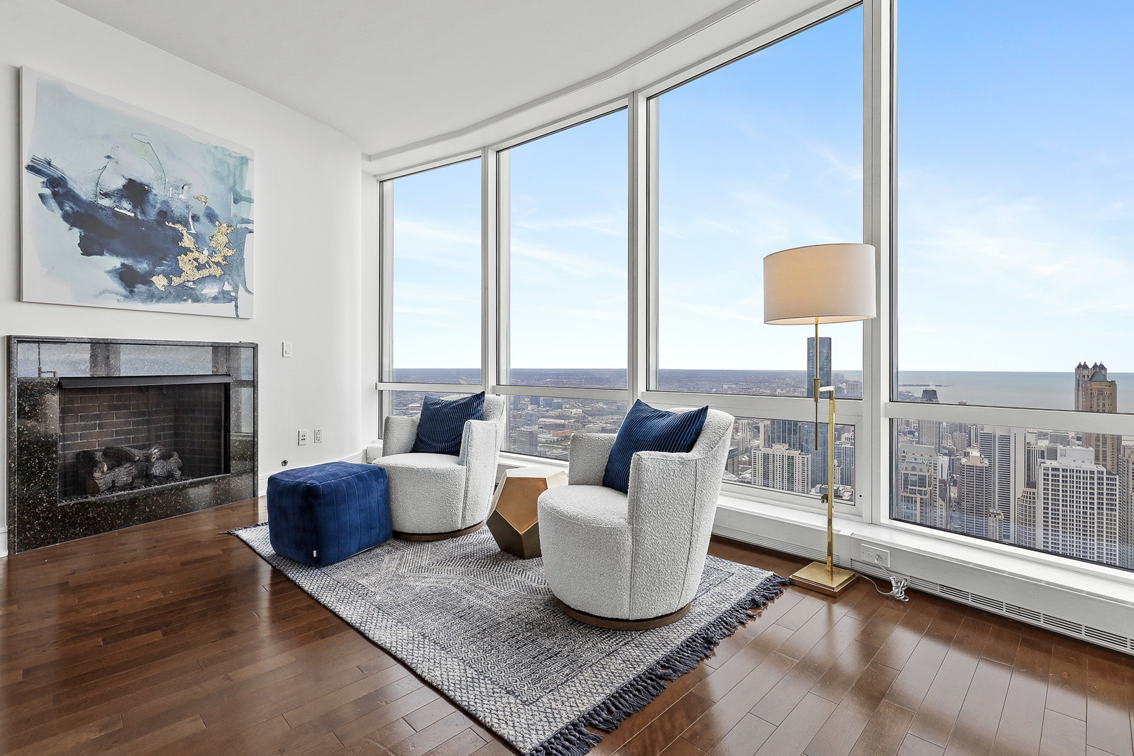 401 North Wabash Avenue, Unit 66A Chicago, IL 60611 - Photo 13 of 26 a living room with furniture and a fireplace
