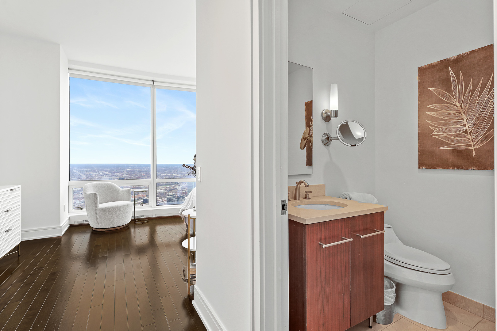 401 North Wabash Avenue, Unit 66A Chicago, IL 60611 - Photo 14 of 26 a very nice looking living room with a large window and wooden floor