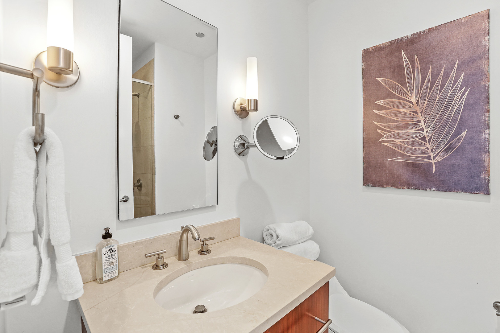 401 North Wabash Avenue, Unit 66A Chicago, IL 60611 - Photo 15 of 26 a bathroom with a sink a mirror and vanity