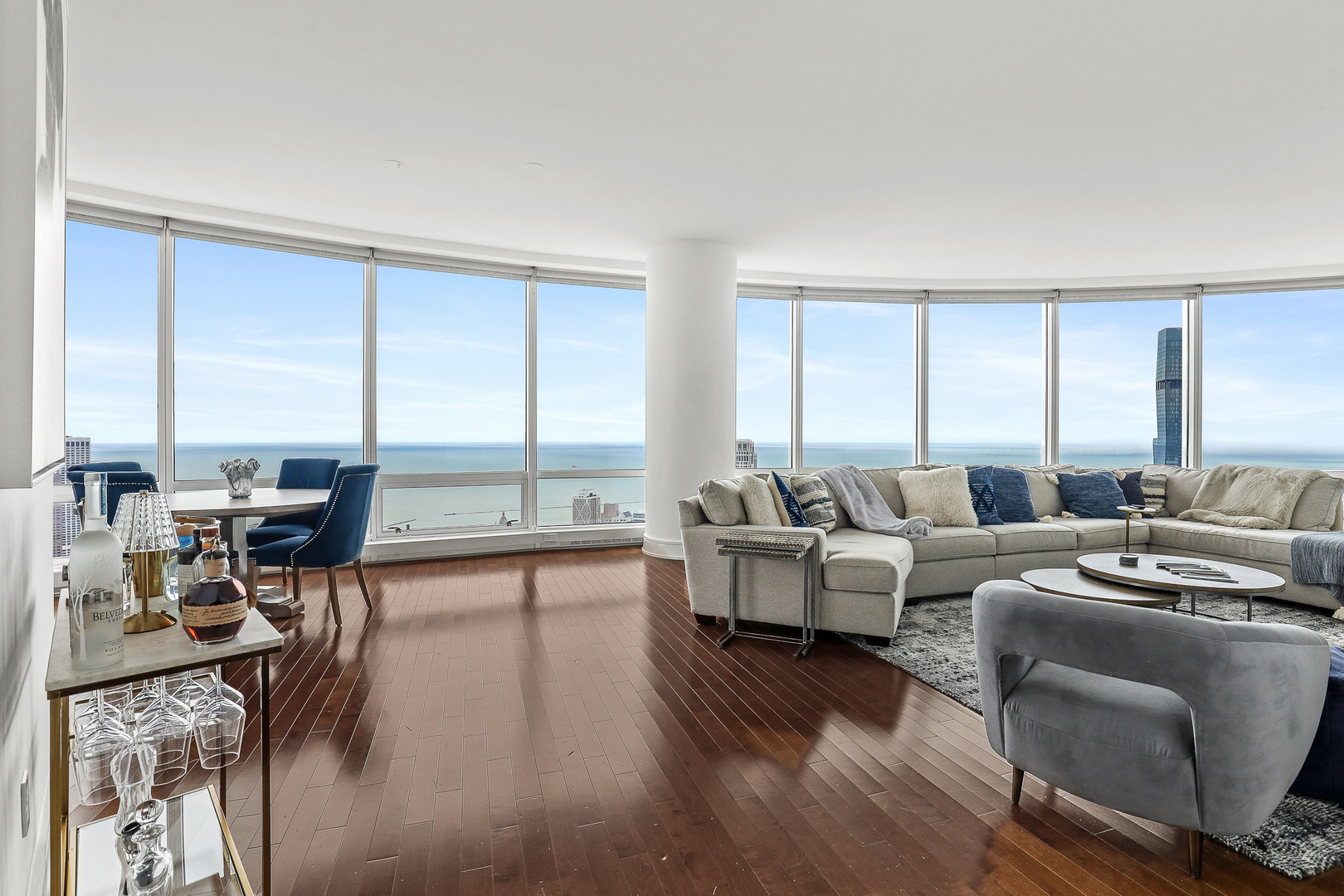 401 North Wabash Avenue, Unit 66A Chicago, IL 60611 - Photo 2 of 26 a living room with furniture and a large window