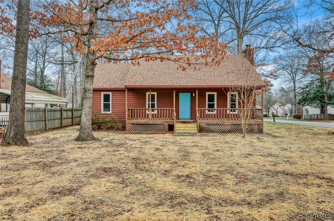 a house with trees in the background