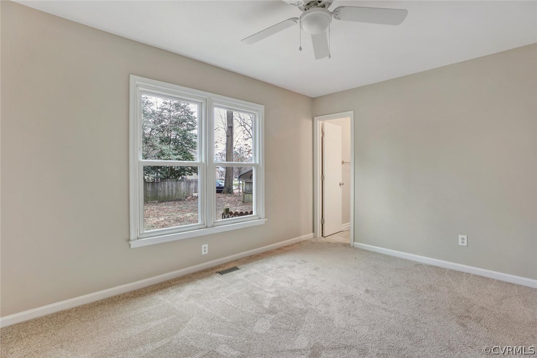 9817 Brenspark Road Chesterfield, VA 23832 - Photo 14 of 17 an empty room with a empty space and windows