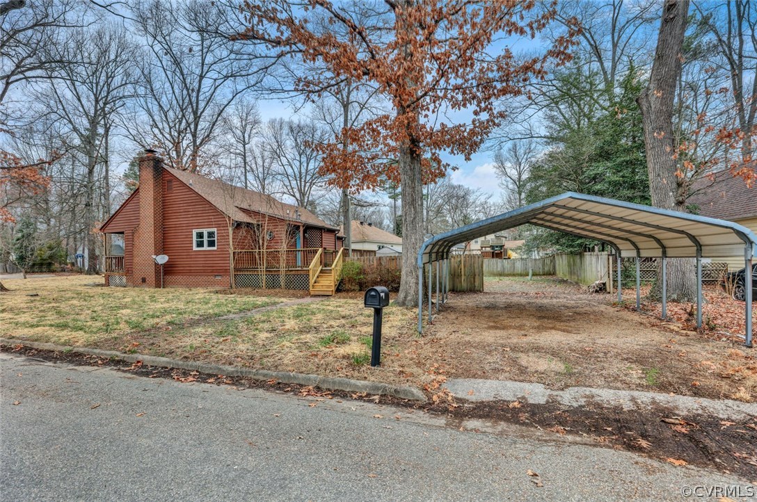 9817 Brenspark Road Chesterfield, VA 23832 - Photo 17 of 17 a view of a house with a yard and large tree