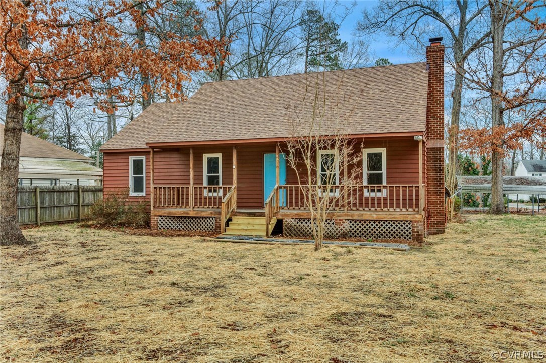 9817 Brenspark Road Chesterfield, VA 23832 - Photo 2 of 17 a view of a house with backyard in the forest