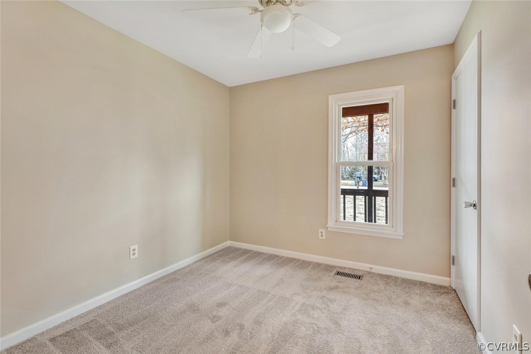 9817 Brenspark Road Chesterfield, VA 23832 - Photo 10 of 17 an empty room with windows and closet