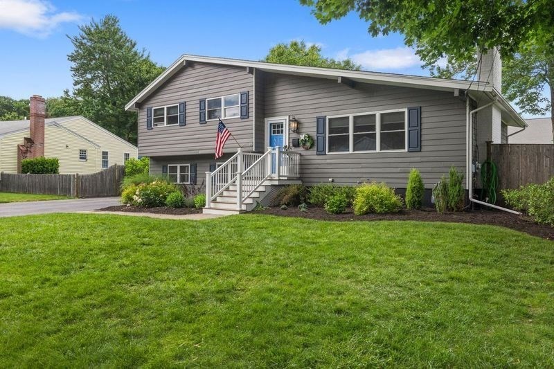 15 Ridgewood Road Westwood, MA 02090 - Photo 1 of 26 a front view of a house with garden