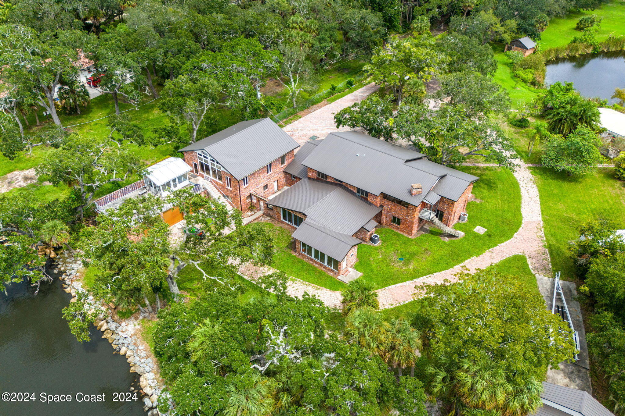 4205 Crooked Mile Road Merritt Island, FL 32952 - Photo 17 of 66 55-web-or-mls-DJI_0459