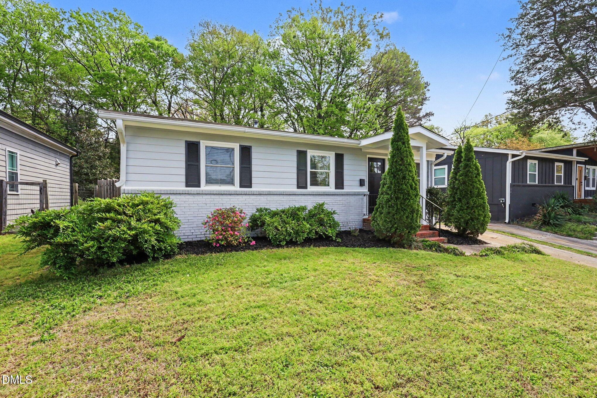 727 South State Street Raleigh, NC 27601 - Photo 29 of 30 front view of a house with a yard