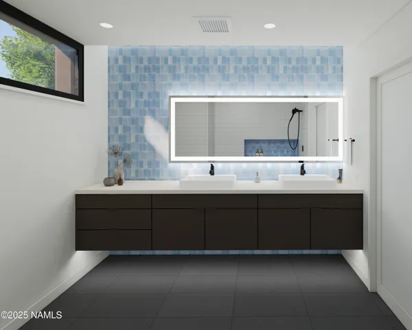 a bathroom with a double vanity sink and mirror