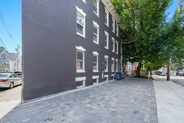 a view of a building with a street