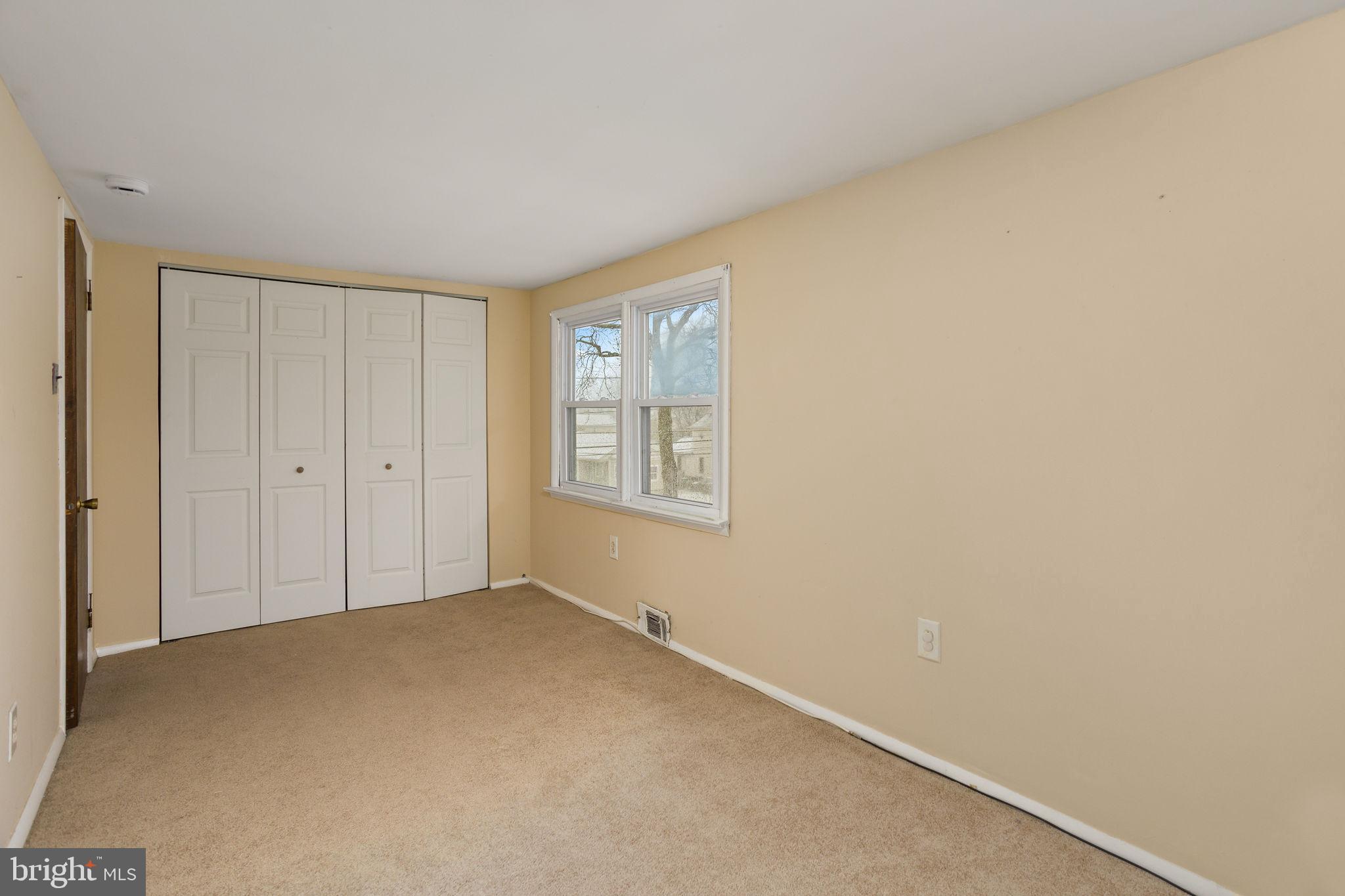 400 Reading Avenue Barrington, NJ 08007 - Photo 17 of 35 a view of an empty room with a window