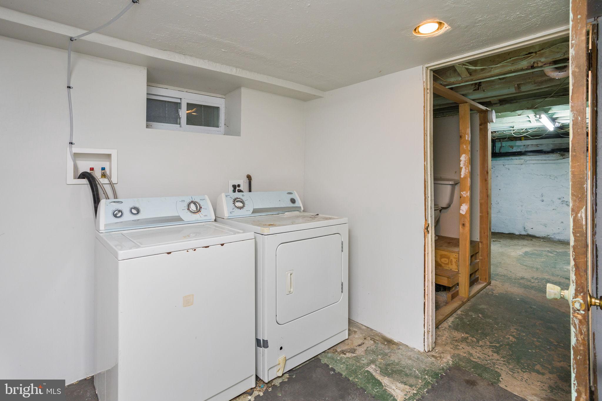 400 Reading Avenue Barrington, NJ 08007 - Photo 29 of 35 a utility room with dryer and washer