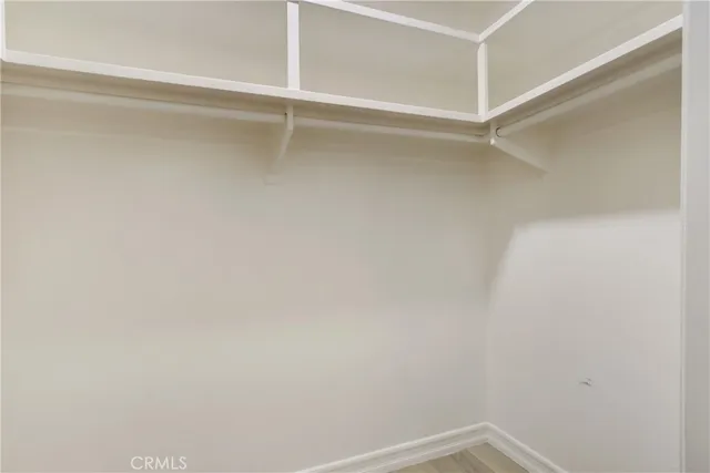 a view of an empty walk in closet
