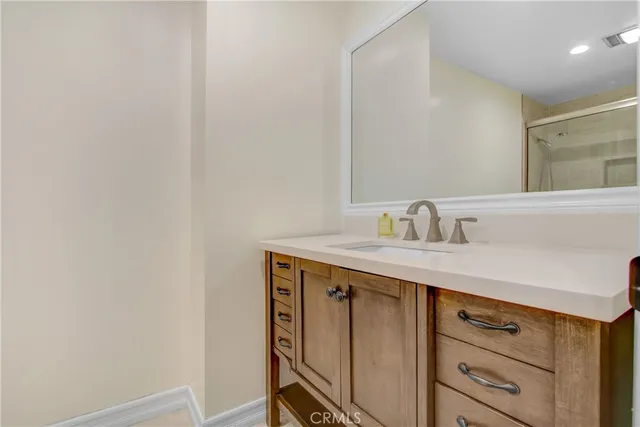 a bathroom with a shower and a toilet