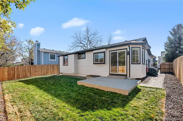 a aerial view of a house with swimming pool