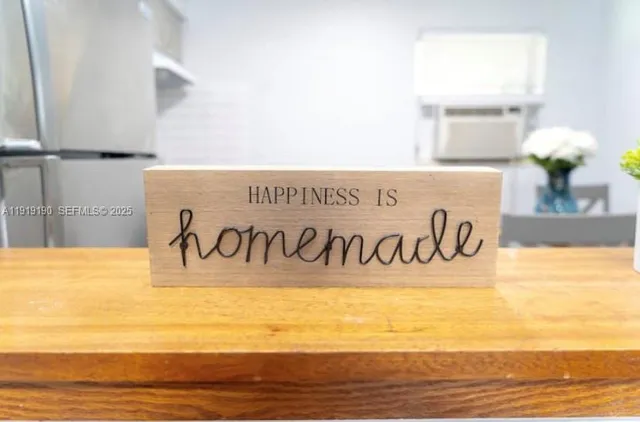 a outdoor view with a table and a potted plants