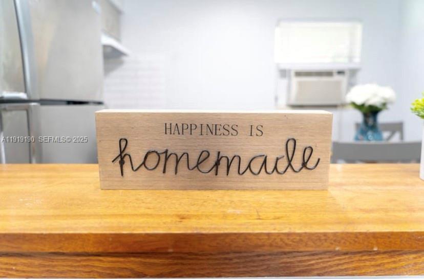 6512 Southwest 24th Street, Unit 1 Miramar, FL 33023 - Photo 5 of 15 a outdoor view with a table and a potted plants