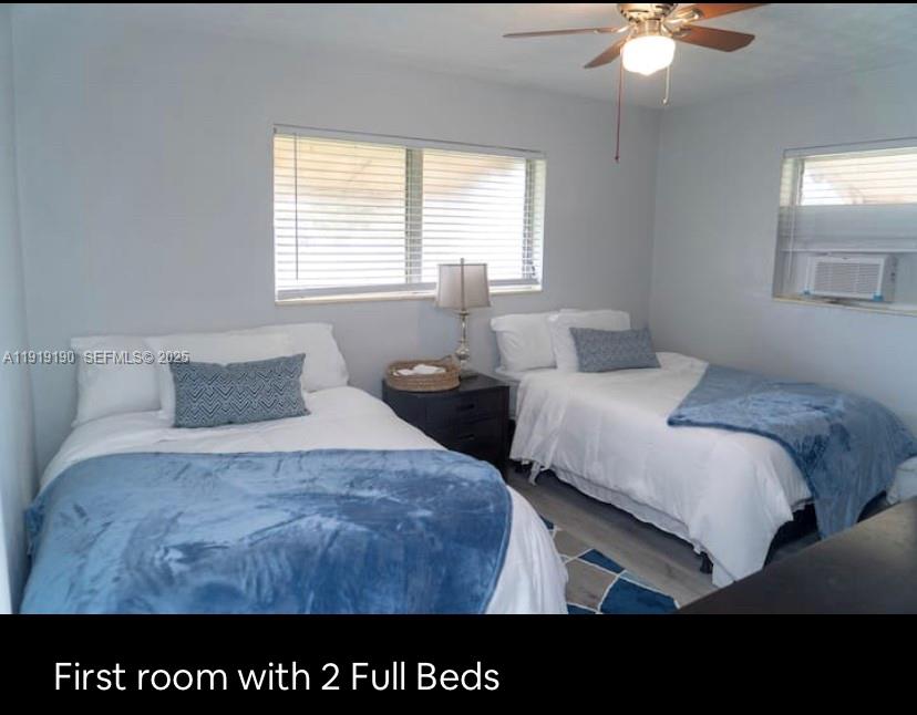 6512 Southwest 24th Street, Unit 1 Miramar, FL 33023 - Photo 6 of 15 a bedroom with a bed and window