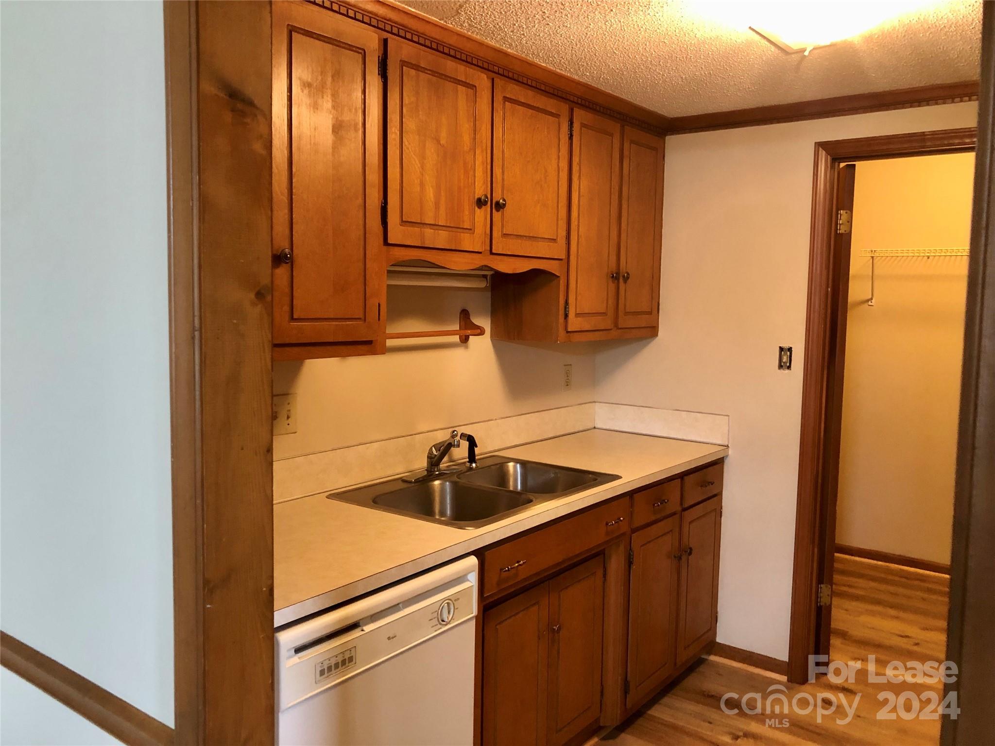 1637 Green Acres Road Lincolnton, NC 28092 - Photo 7 of 12 a kitchen with a sink and cabinets