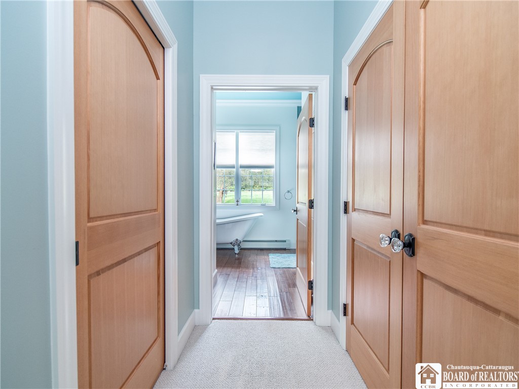 9709 Farel Road Pomfret, NY 14063 - Photo 27 of 46 CLOSETS IN PRIMARY BEDROOM