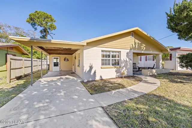 a view of a house with a patio