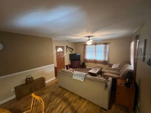 a room with furniture and a window