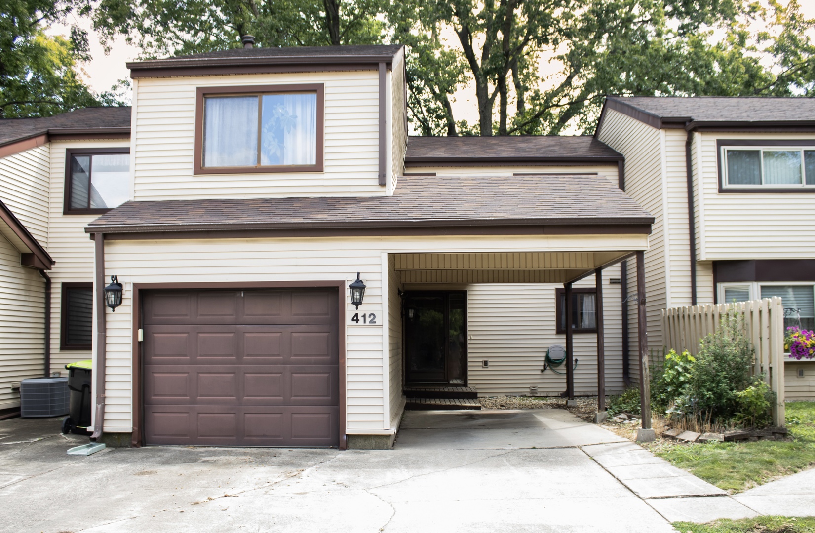 412 Spring Circle Urbana, IL 61802 - Photo 2 of 21 a front view of a house
