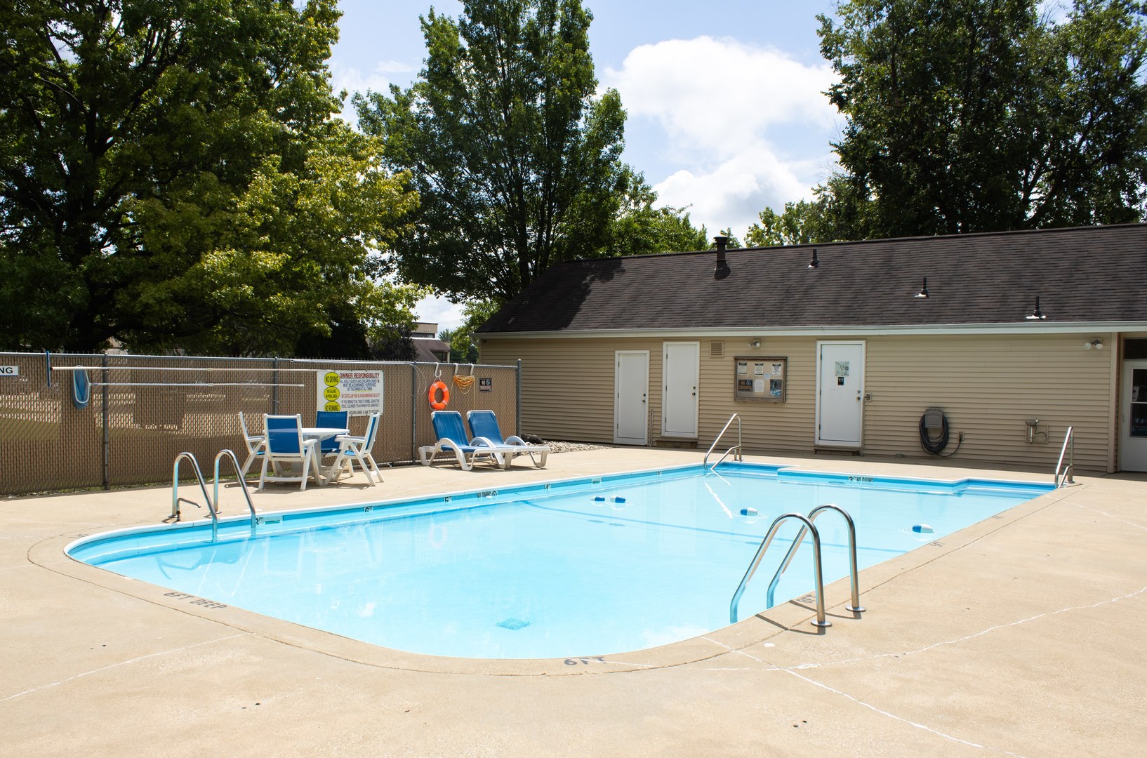 412 Spring Circle Urbana, IL 61802 - Photo 5 of 21 a view of a house with swimming pool and sitting area