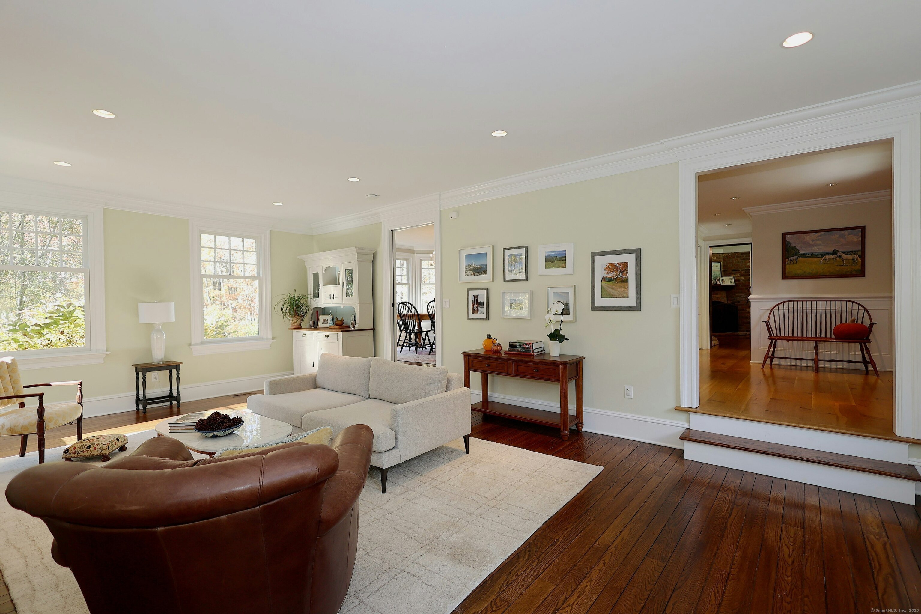 112 Middlebrook Farm Road Wilton, CT 06897 - Photo 15 of 40 a living room with furniture and a wooden floor