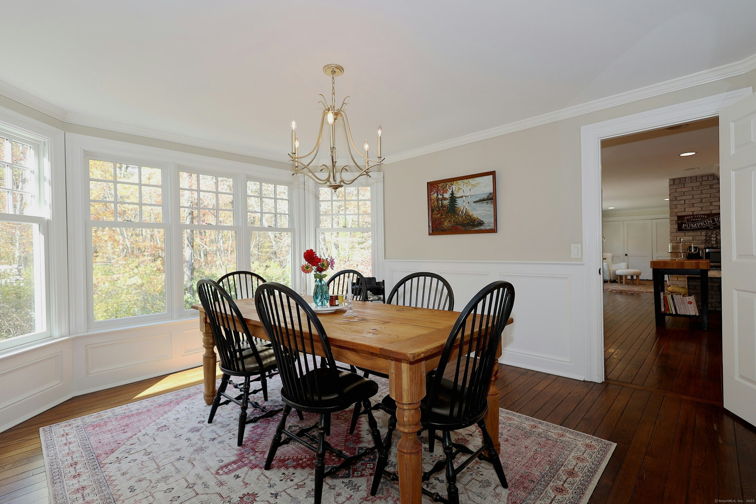 112 Middlebrook Farm Road Wilton, CT 06897 - Photo 17 of 40 a view of a dining room with furniture window and wooden floor