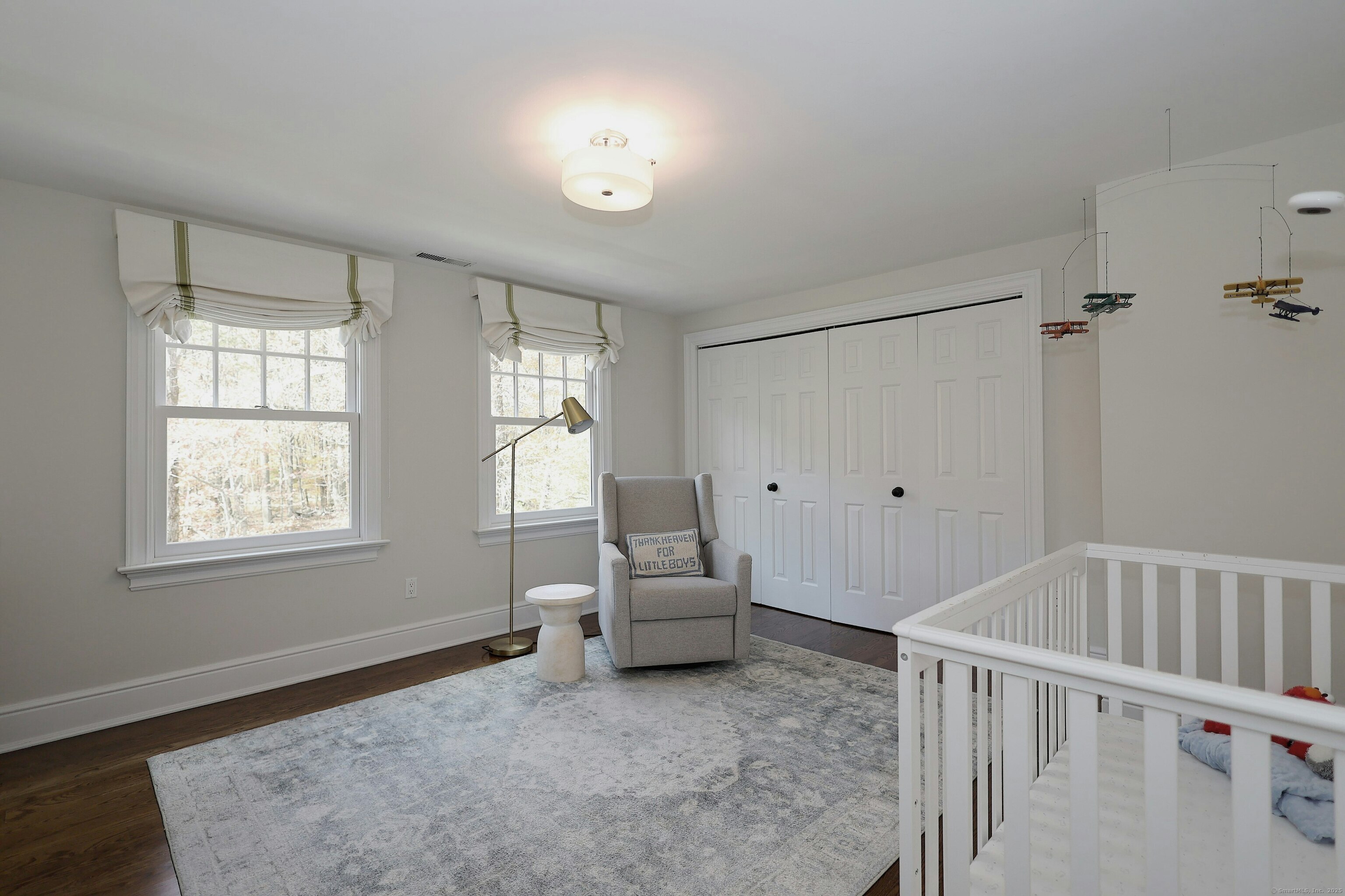 112 Middlebrook Farm Road Wilton, CT 06897 - Photo 34 of 40 a bedroom with a bed and a window